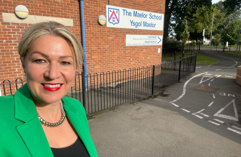 Laura in front of Maelor School sign 