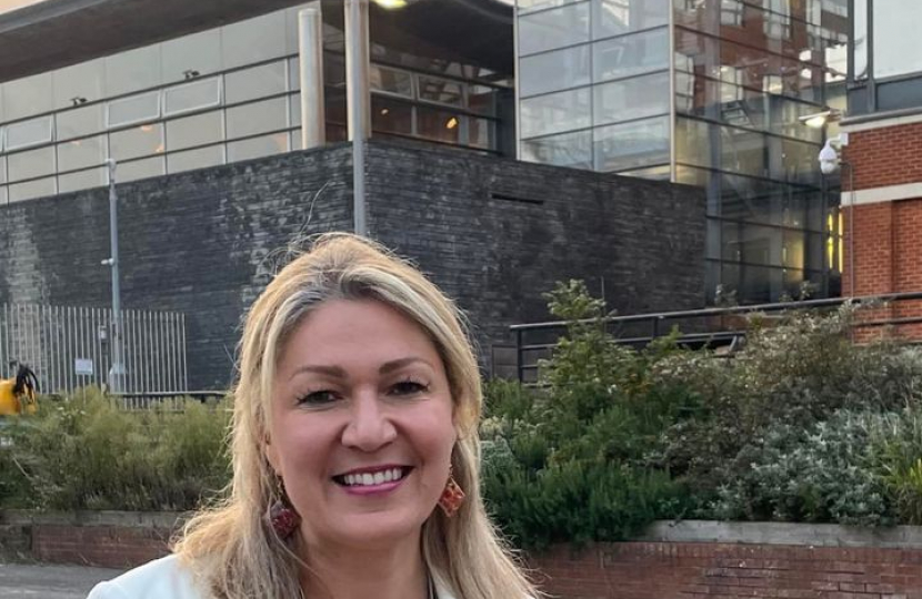 Laura outside Senedd in Yellow